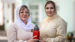 Две многодетные мамы доставили благодатный огонь в Белгородскую область
